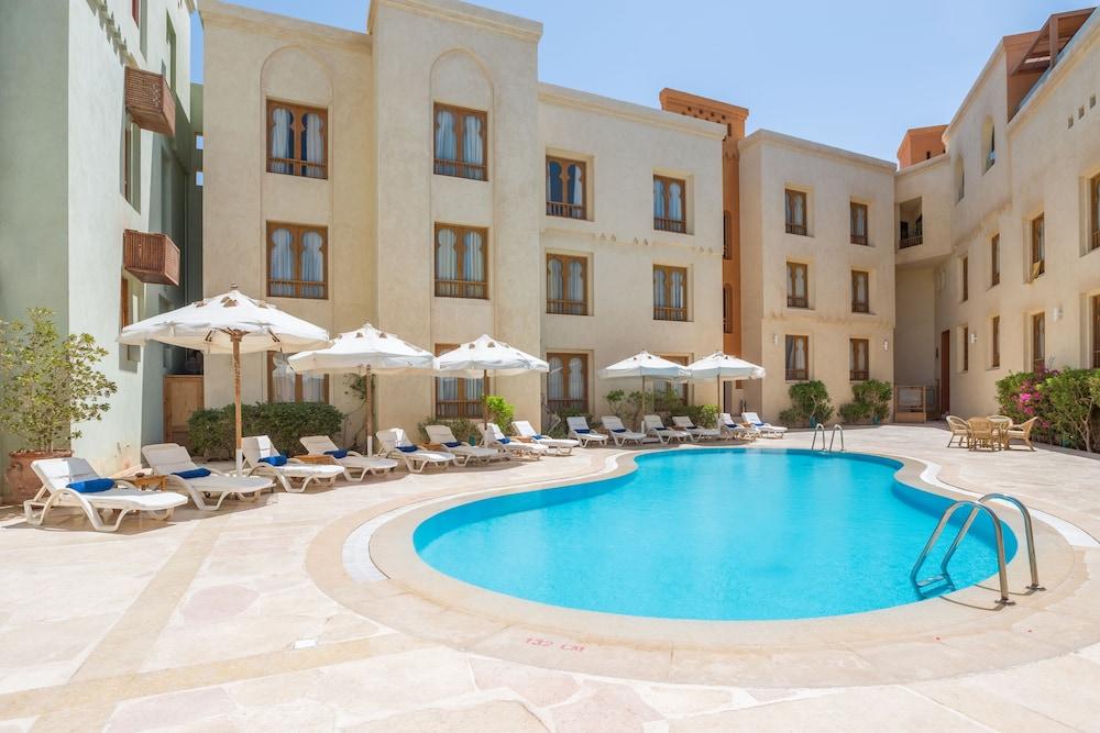 Turtle'S Inn Hotel Hurghada Bagian luar foto