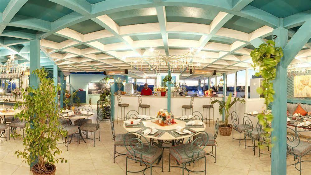 Turtle'S Inn Hotel Hurghada Bagian luar foto