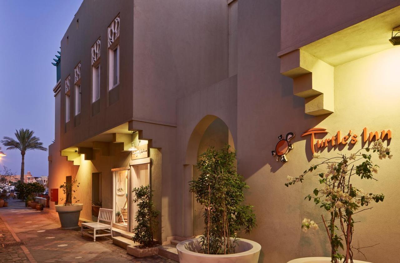 Turtle'S Inn Hotel Hurghada Bagian luar foto